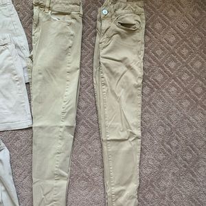 BACK TO SCHOOL PACKAGE: American Eagle khaki jeans and 3 khaki skirts.
